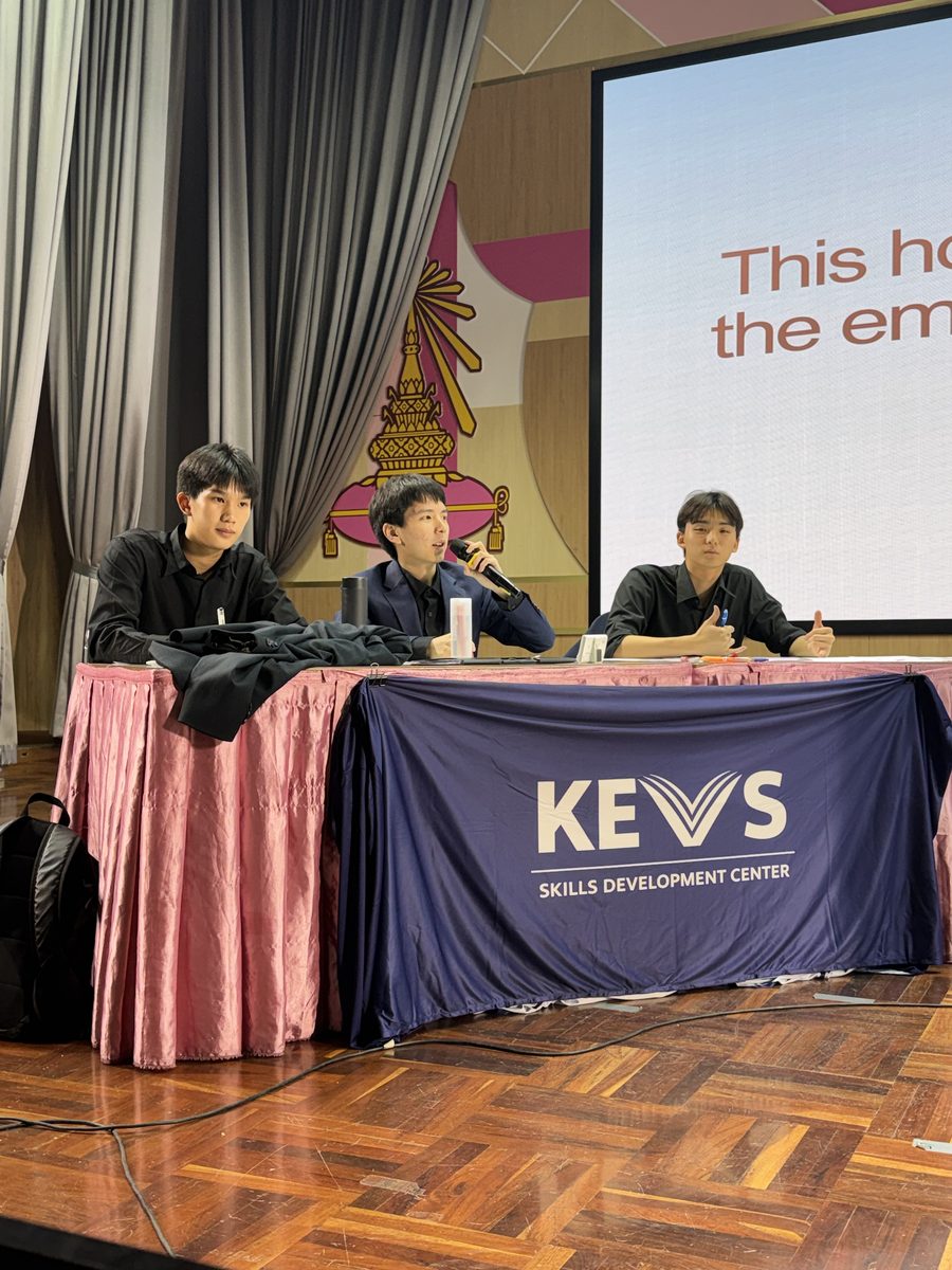 KEV'S debaters on stage at a tournament